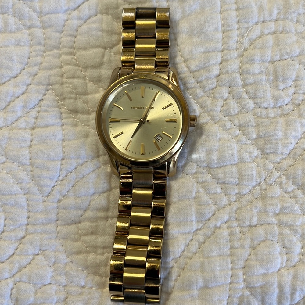 Gold Michael Kors Watch. Needs battery
